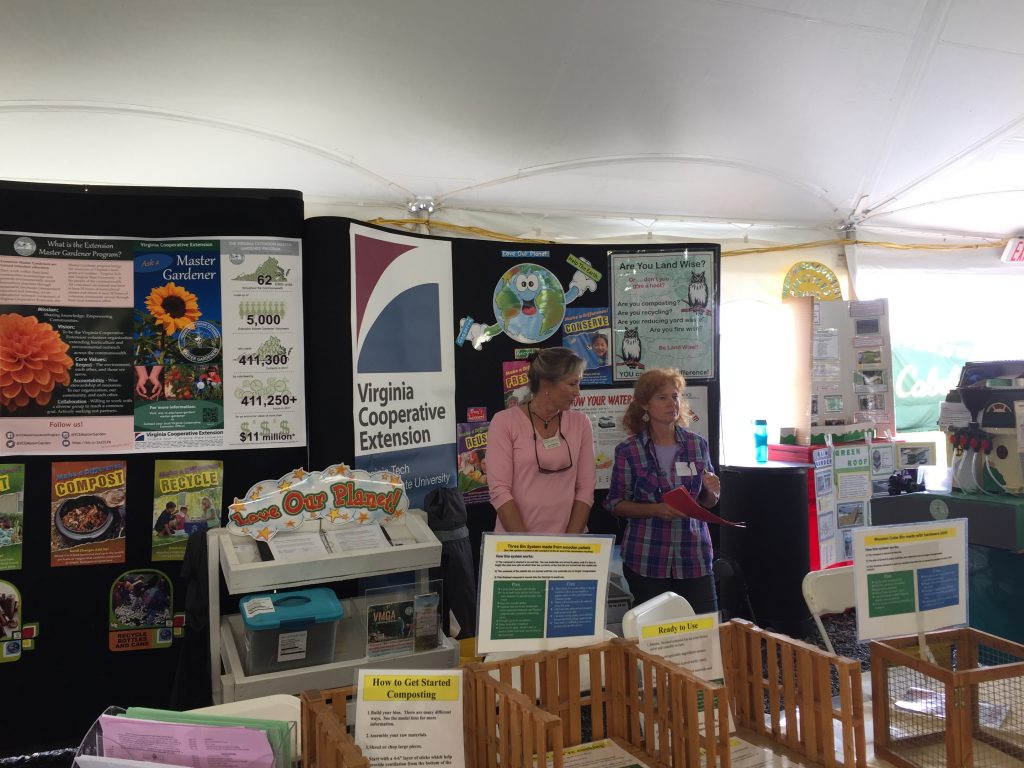 master  gardeners help attendees at state fair booth