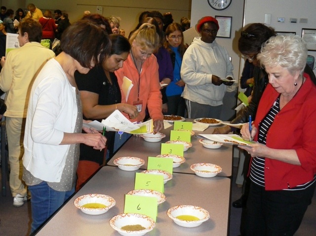 Fairfax administrators participate in spice tasting contest during workshop aimed at reducing sodium intake by increasing awareness of healthier seasoning alternatives.
